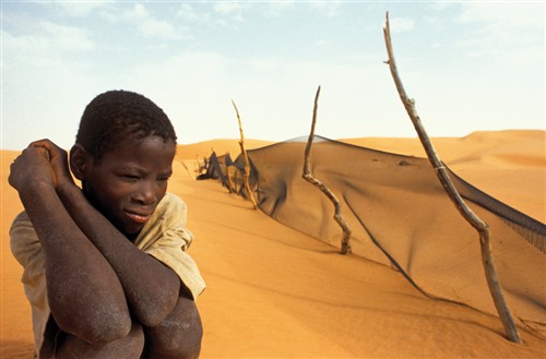 August: Boy on Sand Dunes 