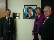 At the dedication of the Joke Waller-Hunter Conference Room of the Secretariat, Ahmed Djoghlaf with Ms Betske Goinga and Mr. Albert Moses, Consul General of the Netherlands, stand before the portrait of Mrs Waller-Hunter.