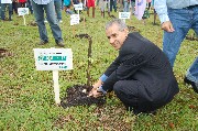 Ahmed Djoghlaf plants one of the 8 million trees that will help offset the environmental impact of the Curitiba meetings.