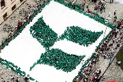 Over 1500 school children from Curitiba create a likeness of the CBD logo in downtown Curitiba